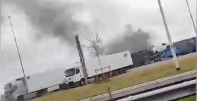 Ajax and Feyenoord Fans Clash, Car Burns at Highway Station